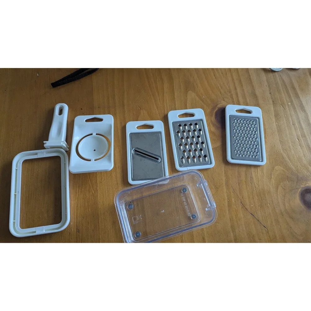 Compact 4-in-1 Kitchen‎ Grater Slicer Set with Storage Container White Clear